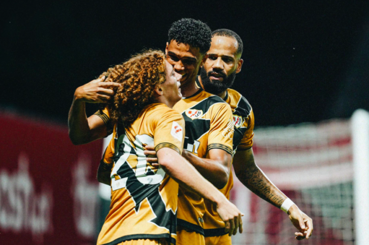 Marco de la Sías y Etienne Eto'o