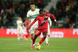 ELCHE, SPAIN - DECEMBER 21: Nobel Mendy of Rayo Vallecano runs with the ball whilst under pressure from Alvaro Rodriguez of Elche CF during the LaLiga EA Sports match between Elche CF and Rayo Vallecano de Madrid at Estadio Manuel Martinez Valero on December 21, 2025 in Elche, Spain. (Photo by Clive Brunskill/Getty Images)