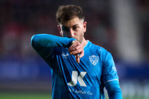 PAMPLONA, SPAIN - JANUARY 04: Adrian Embarba of UD Almeria reacts during the LaLiga EA Sports match between CA Osasuna and UD Almeria at Estadio El Sadar on January 04, 2024 in Pamplona, Spain. (Photo by Juan Manuel Serrano Arce/Getty Images
