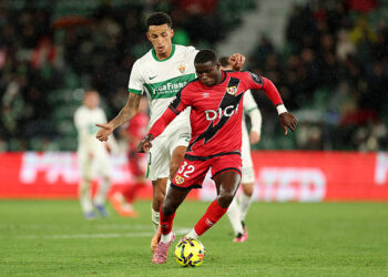 ELCHE, SPAIN - DECEMBER 21: Nobel Mendy of Rayo Vallecano runs with the ball whilst under pressure from Alvaro Rodriguez of Elche CF during the LaLiga EA Sports match between Elche CF and Rayo Vallecano de Madrid at Estadio Manuel Martinez Valero on December 21, 2025 in Elche, Spain. (Photo by Clive Brunskill/Getty Images)